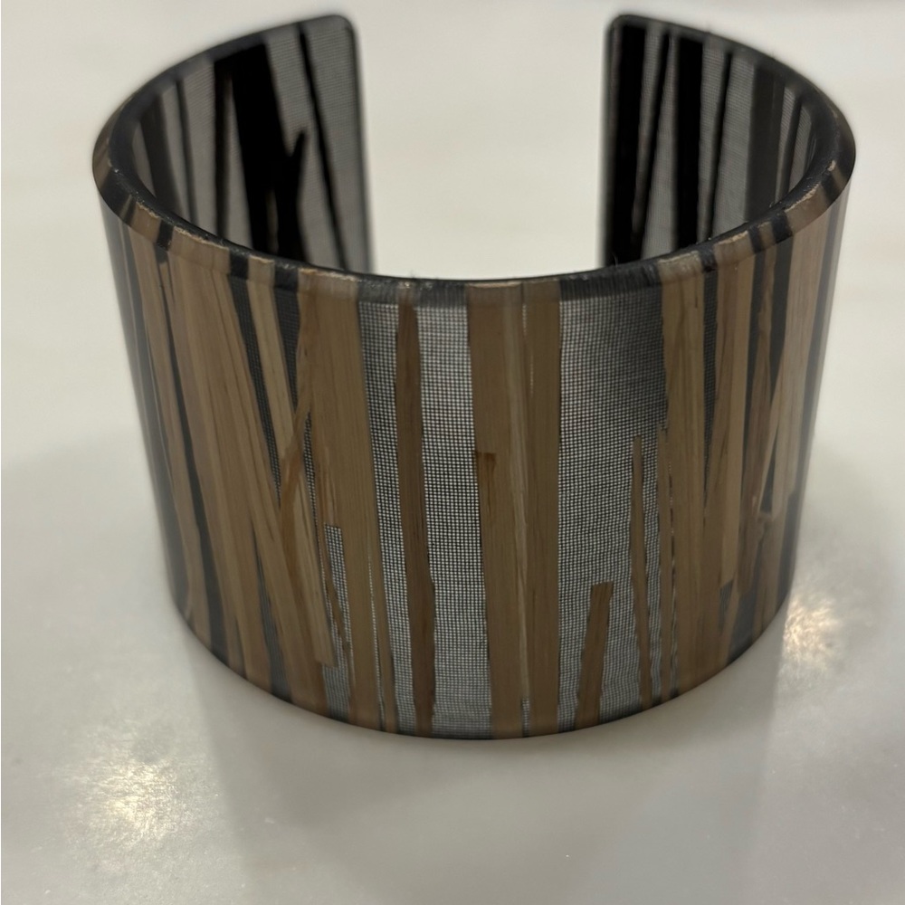 Stylish Black and Brown Watch with Unique Vertical Cutouts